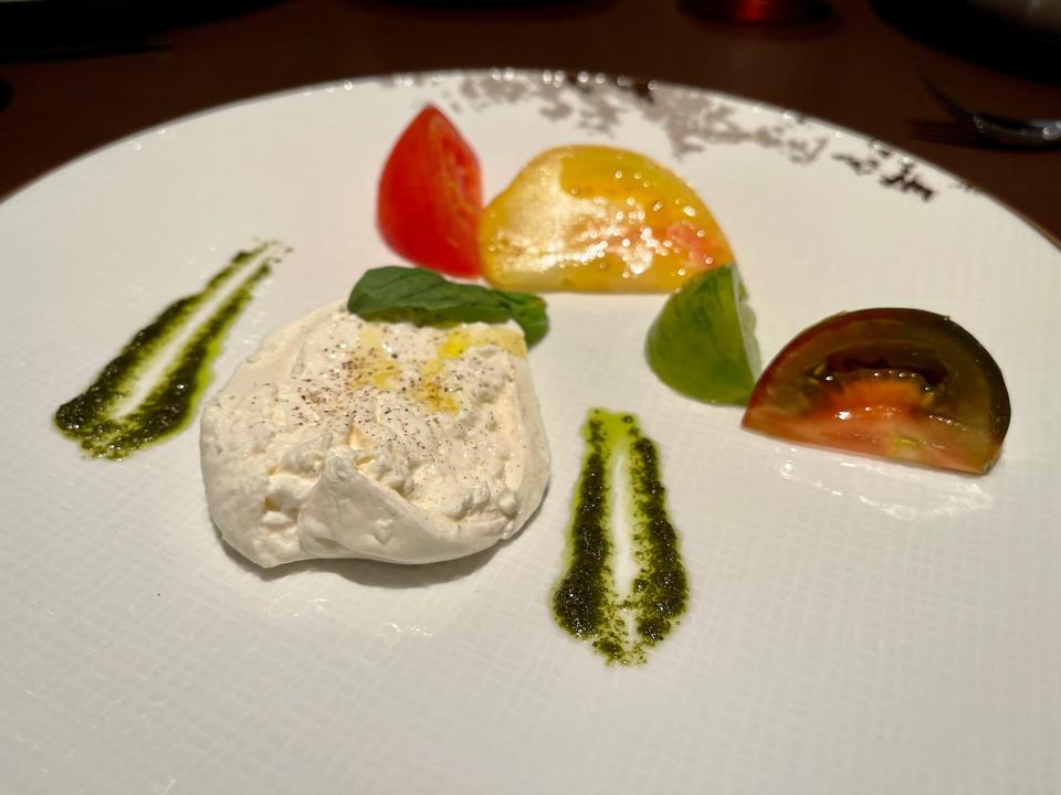 Carly Caramanna disney wish caprese salad at Palo