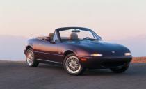 <p>The second MX-5 Miata M Edition differs drastically from the 1994 model, thanks largely to its 15-inch BBS wheels and Merlot Mica paint. Its interior is tan and seats leather, and it still comes with a Nardi shift knob (this time in leather), a fancier audio system, special doorsill kick plates, and M Edition badges on its fenders and floor mats. Little changes for the regular MX-5 Miata outside of tweaks to its option groupings<br></p>