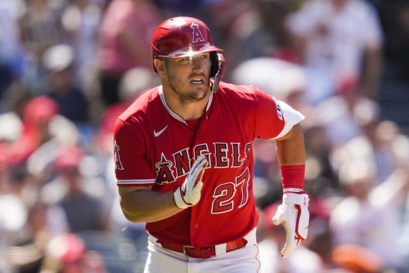 Los Angeles Angels' Mike Trout (27) runs on a single during the seventh inning of a baseball game against the Chicago White Sox in Anaheim, Calif., Thursday, June 29, 2023. (AP Photo/Ashley Landis)