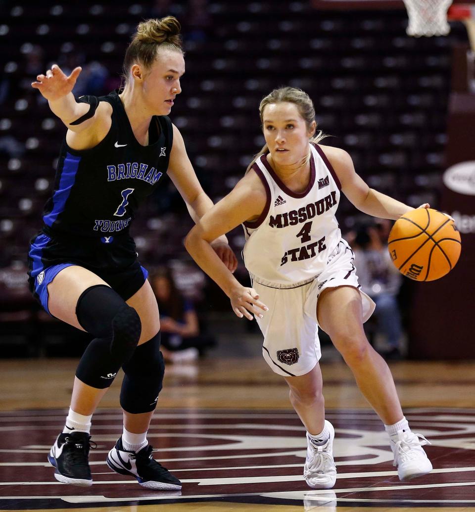 The Missouri State Lady Bears' Lacy Stokes drives to the basket against Brigham Young University at Great Southern Bank Arena in Springfield on December 20, 2023.