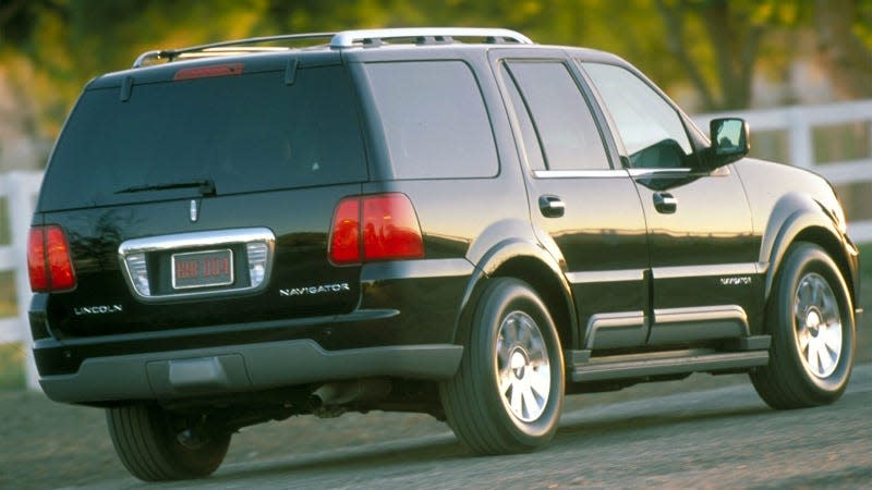 A photo of a black Lincoln Navigator SUV. 