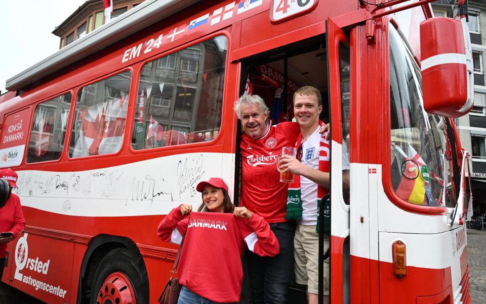 Denmark and England fans on a bus