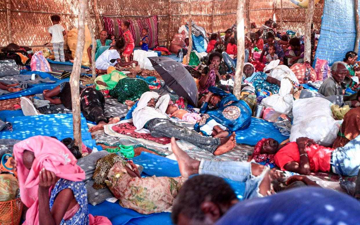 Ethiopian refugees who fled fighting in Tigray province lay in a hut at the Um Rakuba camp in Sudan - EBRAHIM HAMID/AFP via Getty Images