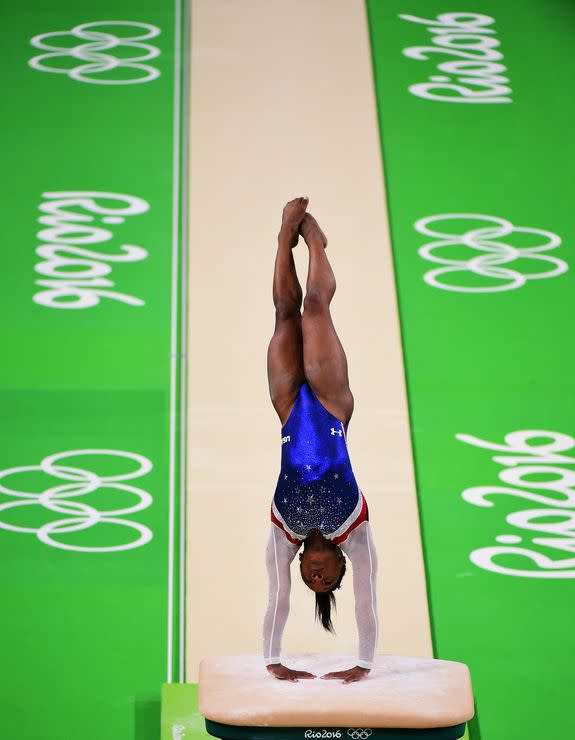 RIO DE JANEIRO, BRAZIL - AUGUST 11: Simone Biles of the United States competes on the vault during the Women's Individual All Around Final on Day 6 of the 2016 Rio Olympics at Rio Olympic Arena on August 11, 2016 in Rio de Janeiro, Brazil. (Photo by Harry How/Getty Images)