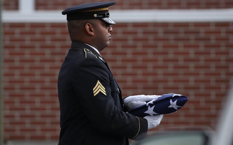 An American flag is carried into the funeral for Alaina Petty on February 19, 2018 in Coral Springs, Florida. (Photo: Joe Raedle via Getty Images)