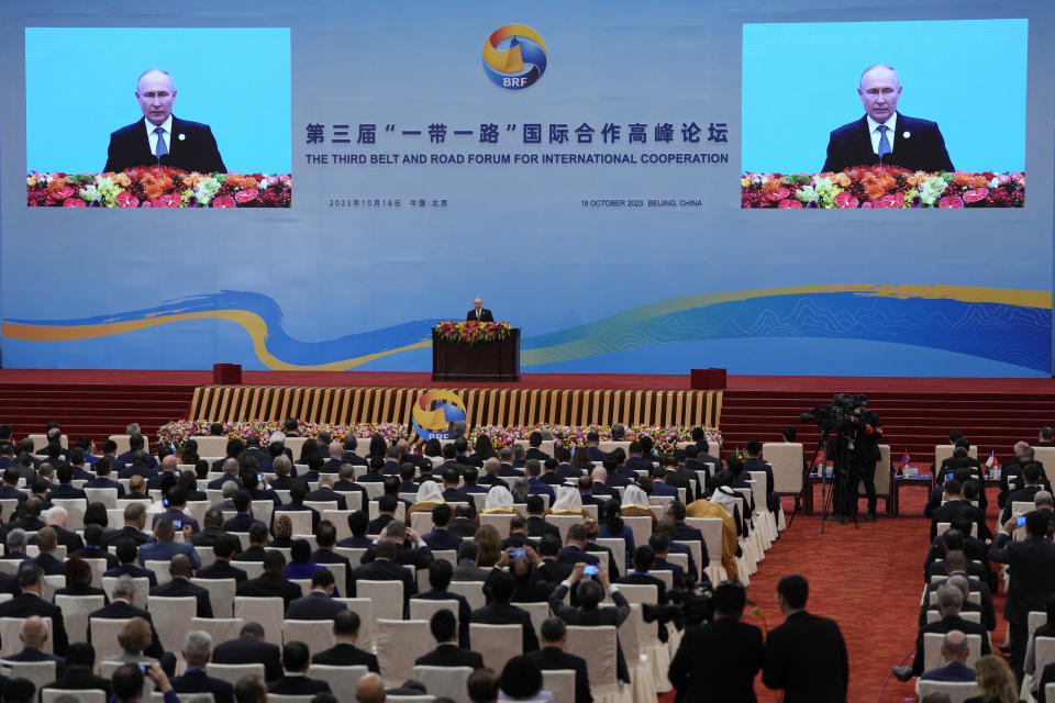 Russian President Vladimir Putin delivers a speech on stage during the Belt and Road Forum at the Great Hall of the People in Beijing, Wednesday, Oct. 18, 2023. (AP Photo/Ng Han Guan)