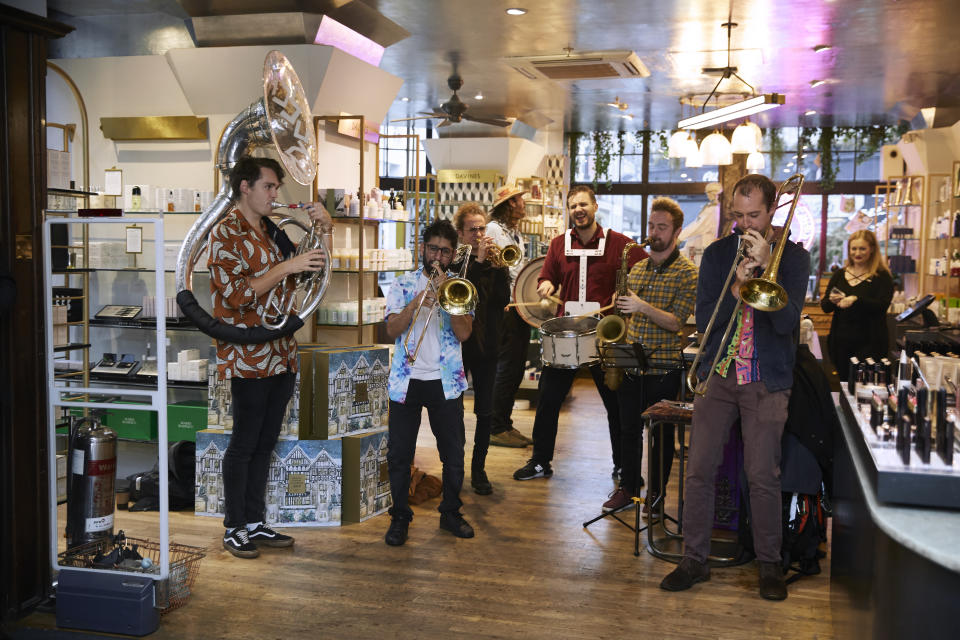 The Brass Funkeys performed surprise renditions of pop classics. [Photo: Liberty London] 