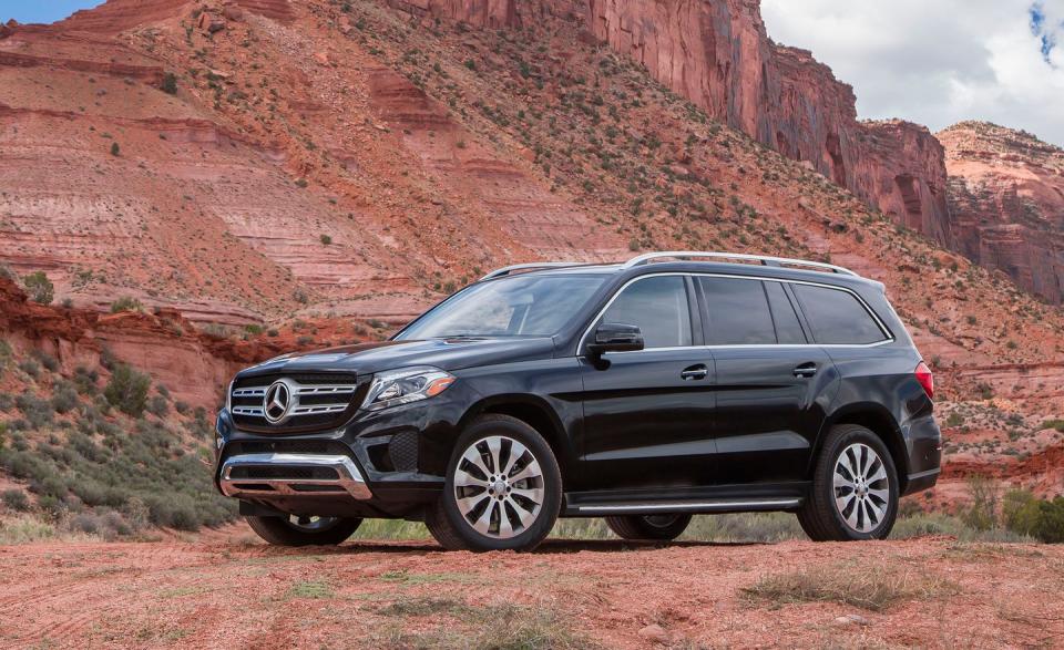 <p>We know, we know, it seems curious that a Mercedes sits at the head of the full-size SUV class. <a rel="nofollow noopener" href="https://www.caranddriver.com/mercedes-benz/gls-class" target="_blank" data-ylk="slk:The GLS-class;elm:context_link;itc:0;sec:content-canvas" class="link ">The GLS-class </a>isn't the biggest in this segment, not by a long shot, nor is it the cheapest. But consider what the GLS's $70,150 base price gets you: A seven-seat SUV with class-leading driving manners and luxury trimmings befitting the three-pointed star badge. You can pay thousands more for a slightly larger, non-luxury-badged SUV, but it will ride rougher, drink fuel, and might not fit in your garage. The space-efficient GLS casts a modest shadow, but its third-row seat is reasonably roomy for two people. A smooth 362-hp twin-turbocharged V-6 is standard, while a 449-hp twin-turbo V-8 is optional. In short, the GLS offers unparalleled value, which is why we've named it to <a rel="nofollow noopener" href="https://www.caranddriver.com/features/2018-10best-trucks-and-suvs-our-top-picks-in-every-segment-feature-mercedes-benz-gls450-best-large-suv-page-8" target="_blank" data-ylk="slk:our 10Best Trucks and SUVs list;elm:context_link;itc:0;sec:content-canvas" class="link ">our 10Best Trucks and SUVs list</a> two years running.</p>