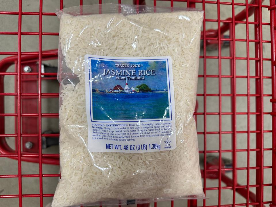 bag of jasmine rice in a red shopping cart