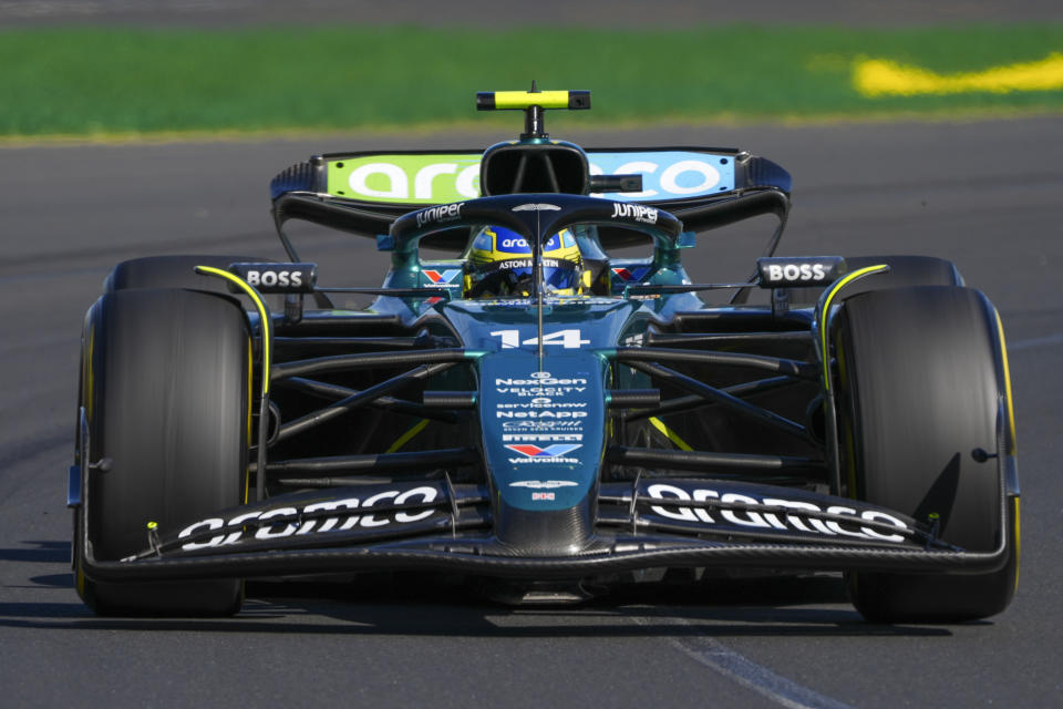 Aston Martin driver Fernando Alonso of Spain steers his car during the Australian Formula One Grand Prix at Albert Park, in Melbourne, Australia, Sunday, March 24, 2024. (AP Photo/Asanka Brendon Ratnayake)