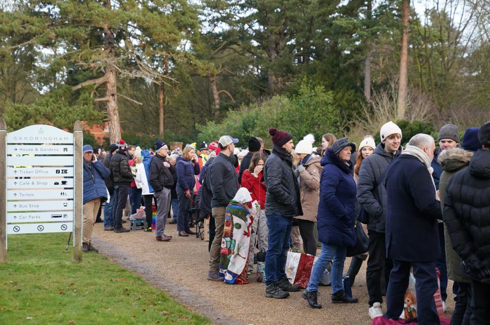 Well-wishers wait to greet the members of the royal family attending the Christmas Day morning church service at St Mary Magdalene Church in Sandringham, Norfolk (Joe Giddens/PA Wire)