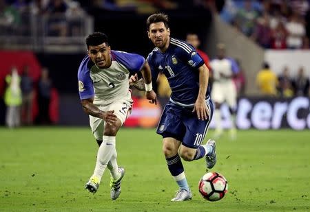 Jun 21, 2016; Houston, TX, USA; Argentina midfielder Lionel Messi (10) and United States defender DeAndre Yedlin (2) battle for the ball during the second half in the semifinals of the 2016 Copa America Centenario soccer tournament at NRG Stadium. Kevin Jairaj-USA TODAY Sports