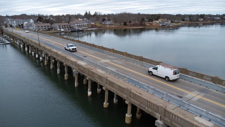 Traffic makes its way on Thursday across the aging Bass River Bridge in South Yarmouth, where lane restrictions are in place for maintenance. Due to structural deficiencies, a $40 million project to replace the bridge is scheduled for bidding this year.