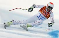 Bode Miller of the U.S. skis during the men's alpine skiing Super-G competition at the 2014 Sochi Winter Olympics at the Rosa Khutor Alpine Center February 16, 2014. REUTERS/Ruben Sprich