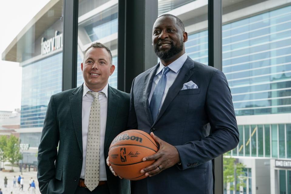 Milwaukee Bucks general manager Jon Horst, left, poses for a picture with new head coach Adrian Griffin at a news conference Tuesday, June 6, 2023, in Milwaukee. (AP Photo/Morry Gash)