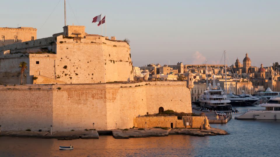 The bastioned Fort St. Angelo sits at the center of Malta's Grand Harbour. - robertharding/Alamy Stock Photo