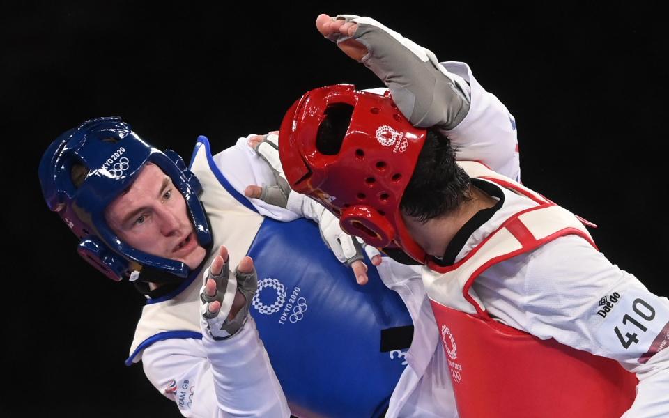 Bradly Sinden wins his taekwondo quarter-final - PAUL GROVER FOR THE TELEGRAPH