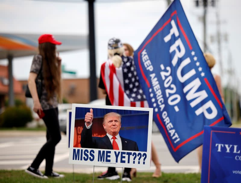 Supporters of former President Trump outside the North Carolina GOP convention in Greenville