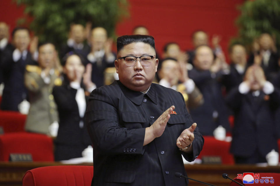 In this photo provided by the North Korean government, North Korean leader Kim Jong Un claps his hands at the ruling party congress in Pyongyang, North Korean, Sunday, Jan. 10, 2021. Kim was given a new title, “general secretary” of the ruling Workers’ Party, formerly held by his late father and grandfather, state media reported Monday, Jan. 11, in what appears to a symbolic move aimed at bolstering his authority amid growing economic challenges. Independent journalists were not given access to cover the event depicted in this image distributed by the North Korean government. The content of this image is as provided and cannot be independently verified. Korean language watermark on image as provided by source reads: "KCNA" which is the abbreviation for Korean Central News Agency. (Korean Central News Agency/Korea News Service via AP)