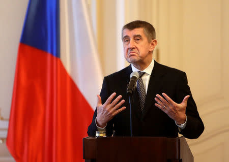 Czech Prime Minister Andrej Babis speaks to media after tendering the resignation of his cabinet to President Milos Zeman at the Prague, Castle in Prague, Czech Republic, January 24, 2018. REUTERS/David W Cerny