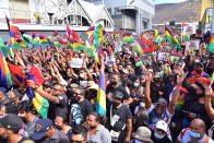 Tens of thousands of people protest in Port Louis, Mauritius, Saturday Aug. 29, 2020, over the government's slow response to an oil spill from a grounded Japanese ship and the alarming discovery of dozens of dead dolphins. (Beekash Roopun/L'express Maurice via AP)