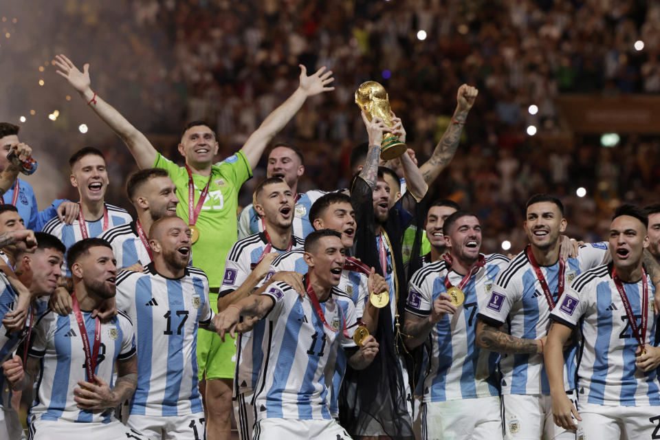 Lionel Messi of Argentina and team celebrate after winning the FIFA World Cup Qatar 2022.