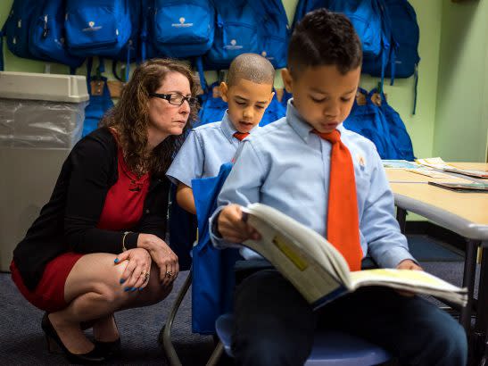 Young readers at Harlem Success Academy with founder Eva Moskowitz. (Benjamin Lowy/Getty Images)