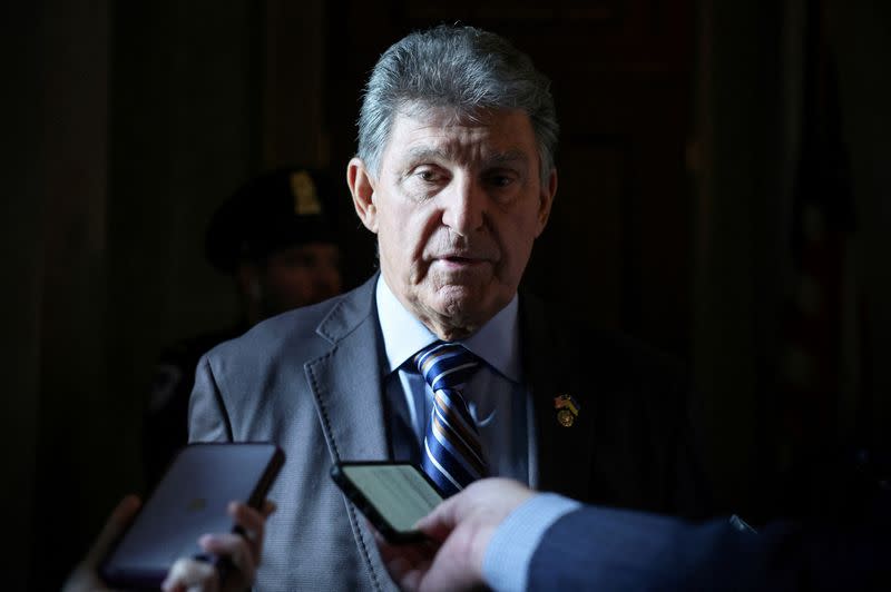 FILE PHOTO: Senator Joe Manchin (D-WV) speaks to journalists in the United States Capitol building in Washington