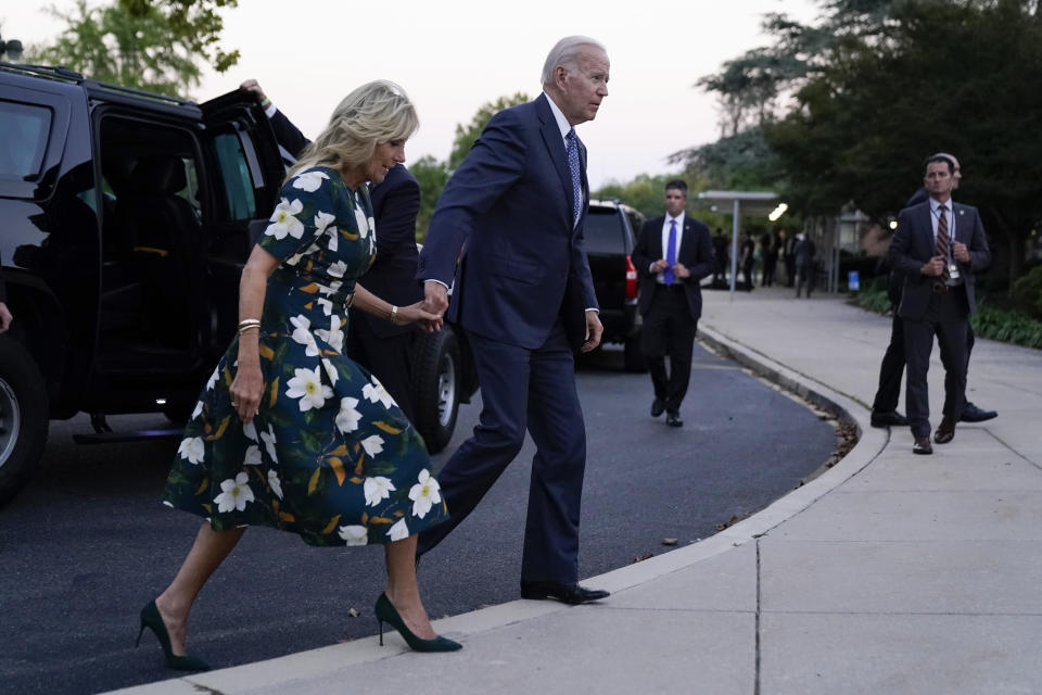 President Joe Biden and first lady Jill Biden arrive to vote in the Delaware primary election at Tatnall School in Wilmington, Del., Tuesday, Sept. 13, 2022. (AP Photo/Andrew Harnik)