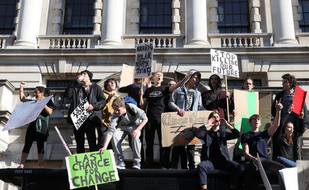 People take part in a "youth strike for climate change" demonstration in London, Britain February 15, 2019. REUTERS/Simon Dawson