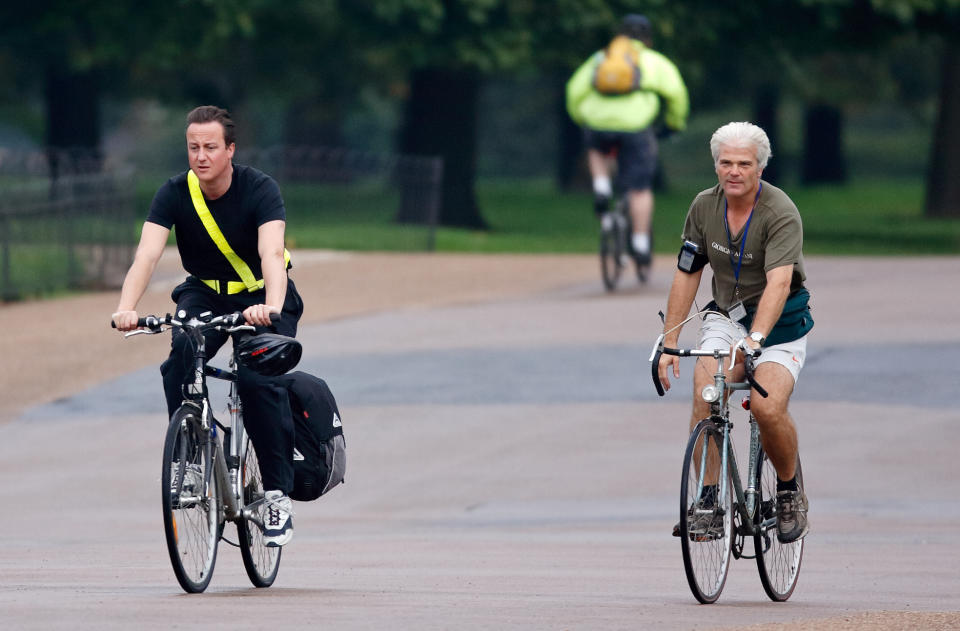 LONDON, UNITED KINGDOM - OCTOBER 11: (EMBARGOED FOR PUBLICATION IN UK NEWSPAPERS UNTIL 24 HOURS AFTER CREATE DATE AND TIME) Leader of the Conservative Party David Cameron and Desmond Swayne (Parliamentary Private Secretary to David Cameron) seen cycling through Hyde Park on October 11, 2006 in London, England. (Photo by Max Mumby/Indigo/Getty Images)