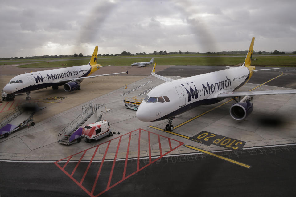 Two Monarch Airlines planes at Luton Airport, going nowhere (AP Photo/Alastair Grant)