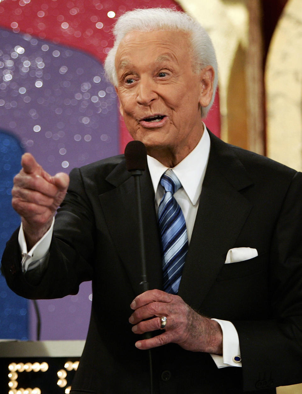 FILE - In this June 6, 2007 file photo shows game show host Bob Barker gesturing during the taping of his final episode of "The Price Is Right" in Los Angeles. The 40th anniversary special of the popular daytime game show aired Tuesday, Sept. 4, 2012 on CBS. (AP Photo/Damian Dovarganes, file)