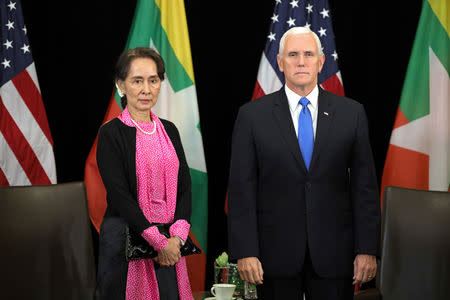 Myanmar's State Counsellor Aung San Suu Kyi and U.S. Vice President Mike Pence hold a bilateral meeting in Singapore, November 14, 2018. REUTERS/Athit Perawongmetha