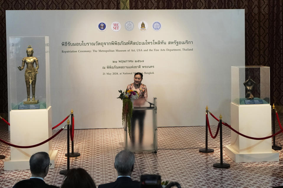 Thailand Culture Minister Sudawan Wangsuphakijkosol talks to media during a repatriation ceremony at National Museum in Bangkok, Thailand, Tuesday, May 21, 2024. Thailand's National Museum hosted a welcome-home ceremony Tuesday for two ancient statues that were illegally trafficked from Thailand by a British collector of antiquities and were returned from the collection of New York’s Metropolitan Museum of Art. (AP Photo/Sakchai Lalit)