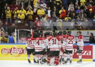 Canada's players leave the ice following their loss to Russia in their IIHF World Junior Championship bronze medal ice hockey game in Malmo, Sweden, January 5, 2014. REUTERS/Alexander Demianchuk (SWEDEN - Tags: SPORT ICE HOCKEY)