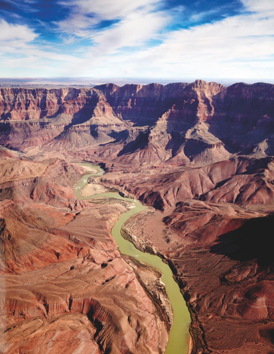 The sections of the Grand Canyon that are divided by the Colorado River.