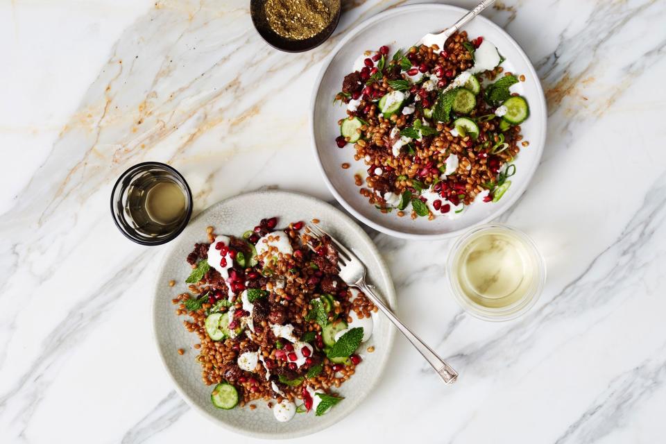 If you've got a batch of <a href="https://www.epicurious.com/expert-advice/how-to-cook-whole-grains-quinoa-farro-millet-spelt-rye-bulgur-rice-recipes-article?mbid=synd_yahoo_rss" rel="nofollow noopener" target="_blank" data-ylk="slk:cooked grains;elm:context_link;itc:0;sec:content-canvas" class="link ">cooked grains</a> in your fridge, you're already halfway to tonight's dinner. If you don't have wheat berries, any grain will work. No merguez? Use sweet Italian pork or chicken sausages instead. The pomegranate seeds add a pop of flavor. <a href="https://www.epicurious.com/recipes/food/views/wheat-berry-bowl-with-merguez-and-pomegranate?mbid=synd_yahoo_rss" rel="nofollow noopener" target="_blank" data-ylk="slk:See recipe.;elm:context_link;itc:0;sec:content-canvas" class="link ">See recipe.</a>