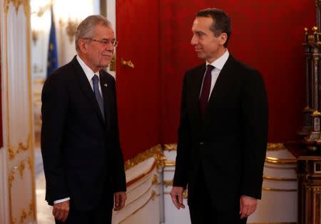 Austrian Chancellor Christian Kern talks to President Alexander Van der Bellen in the presidential office in Vienna, Austria October 18, 2017. REUTERS/Leonhard Foeger