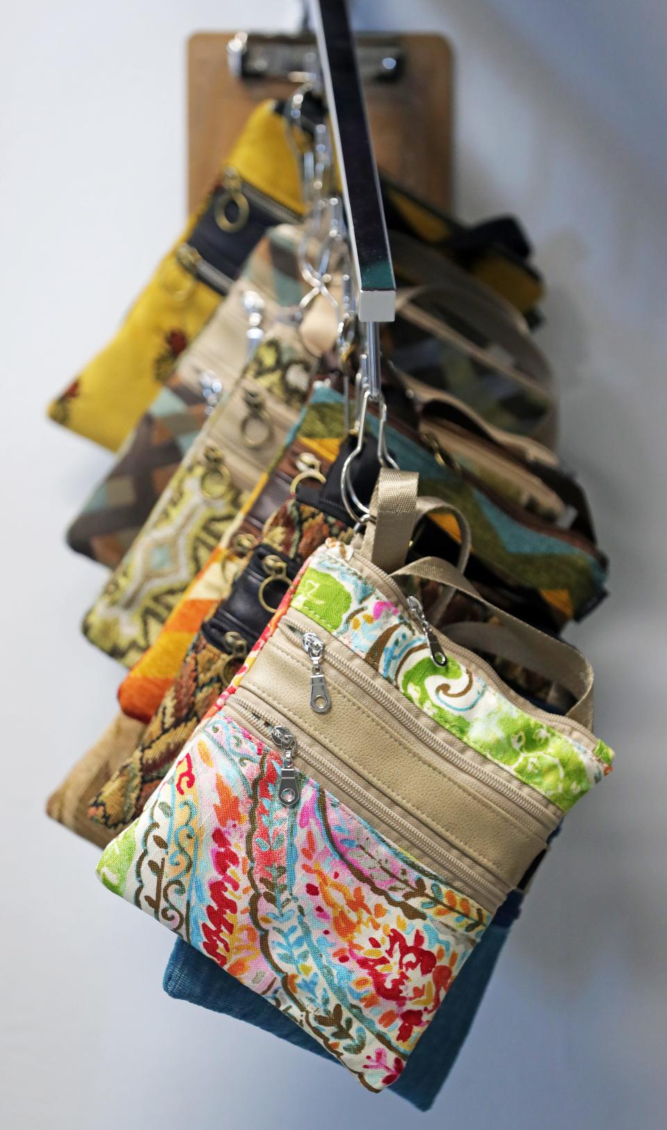 A selection of handbags made by Jennifer Couch, owner of JENCI, a recently opened storefront at 159 Main.