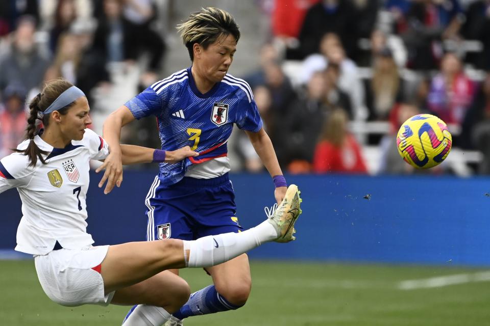 U.S. forward Ashley Hatch (7) kicks the ball away from <a class="link " href="https://sports.yahoo.com/soccer/teams/japan-women/" data-i13n="sec:content-canvas;subsec:anchor_text;elm:context_link" data-ylk="slk:Japan;sec:content-canvas;subsec:anchor_text;elm:context_link;itc:0">Japan</a> defender <a class="link " href="https://sports.yahoo.com/soccer/players/1720999" data-i13n="sec:content-canvas;subsec:anchor_text;elm:context_link" data-ylk="slk:Moeka Minami;sec:content-canvas;subsec:anchor_text;elm:context_link;itc:0">Moeka Minami</a> (3) during the second half of a SheBelieves Cup soccer match Sunday, Feb. 19, 2023, in Nashville, Tenn. The United States won 1-0. | Mark Zaleski, Associated Press
