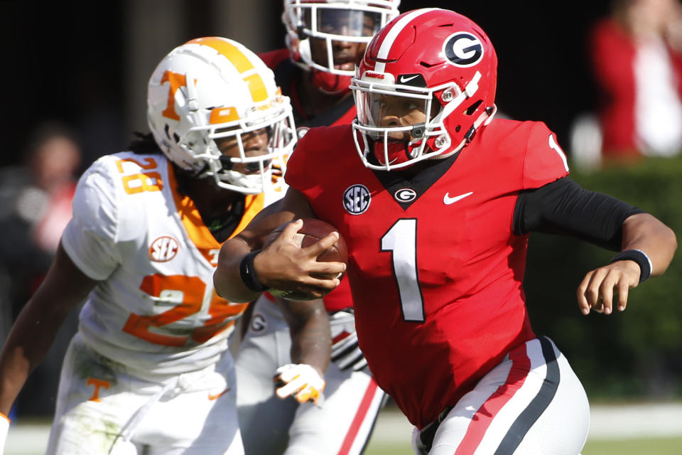 Georgia quarterback Justin Fields (1) runs during the first half of an NCAA college football game against Tennessee during an NCAA college football game, Saturday, Sept. 29, 2018, at Sanford Stadium in Athens, Ga. (Joshua L. Jones/Athens Banner-Herald via AP)