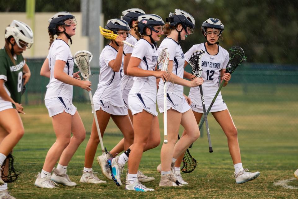 St. Edward's celebrates a goal against Melbourne in a high school girls lacrosse game Wednesday, April 3, 2024, in Indian River County.