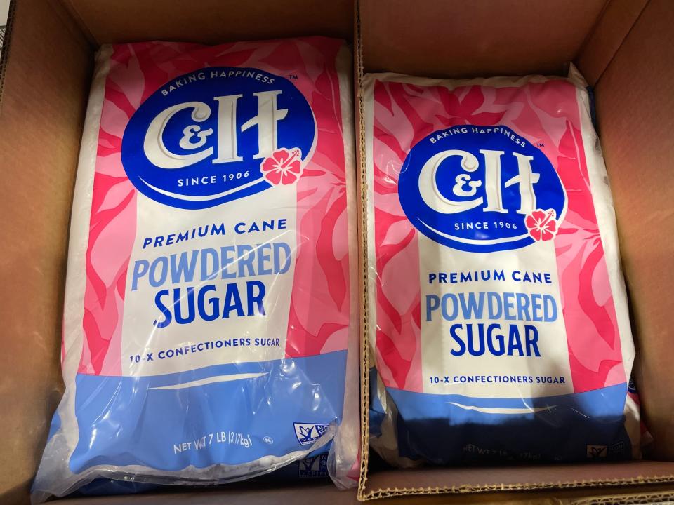 pink and blue bags of C&H's powdered sugar at Costco