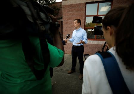 Dan McCready, Democratic candidate in the special election for North Carolina's 9th Congressional District, speaks to the media outside a polling station on election day, in Charlotte, North Carolina