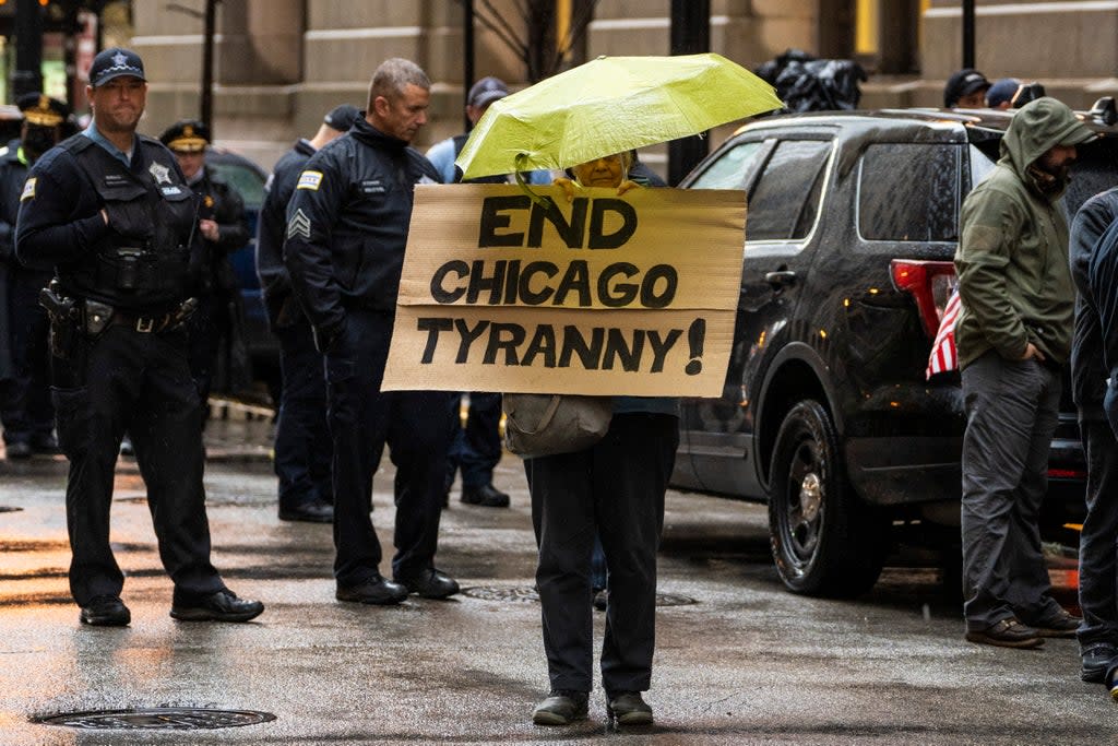 Fraternal Order of Police Lodge 7 members and their supporters protest against Covid-19 vaccine mandates outside City Hall before a Chicago City Council meeting, on 25 October, 2021 (Ashlee Rezin/Sun-Times)