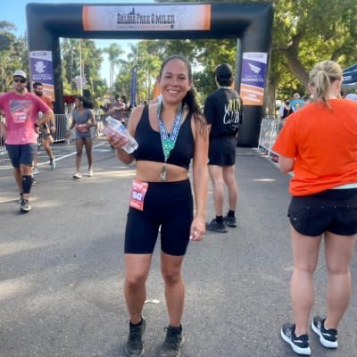 Liz Woods posing after marathon