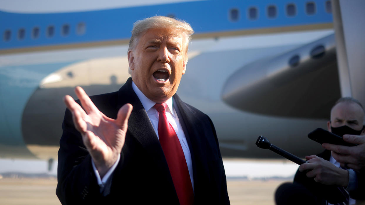 President Trump speaks to the media on Tuesday before boarding Air Force One at Joint Base Andrews in Maryland.