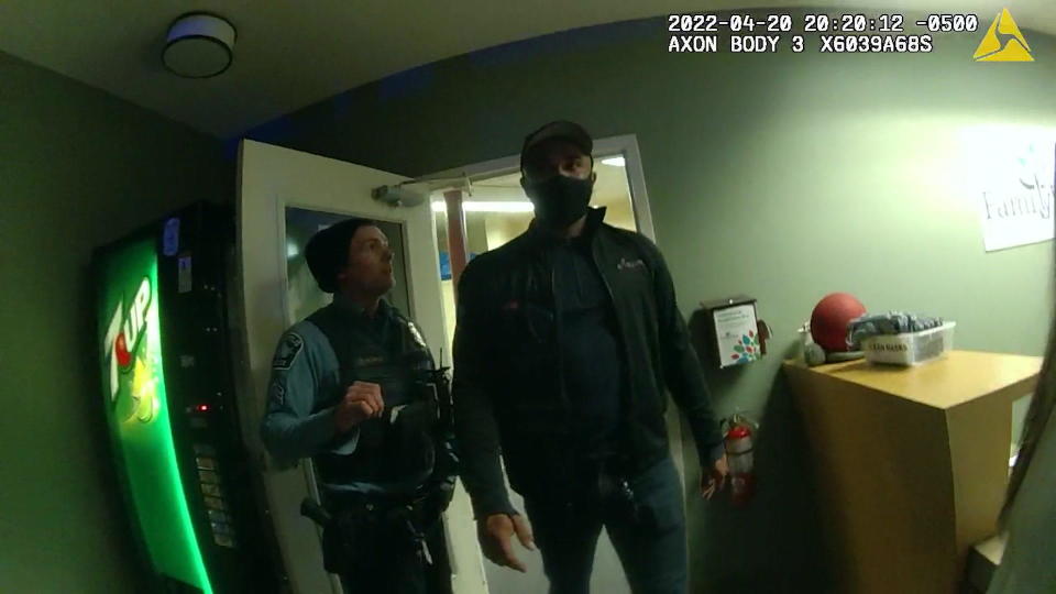 Police body cameras show Tim Amacher being questioned inside the FamilyWise parenting center, where he was visiting with his son on April 20, 2022. / Credit: Hennepin County District Court