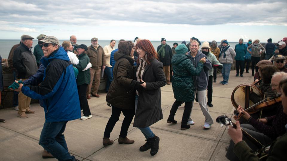 Couples dance at Forty Steps along Newport's Cliff Walk in 2022.